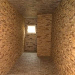 Corridoio interno con rivestimento in pietra naturale